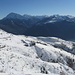 l'alpeggio e sullo sfondo a sinistra il monte Legnone: visibile la nuova e lunga strada
