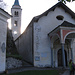 Il campanile e la chiesa di Santa Maria Val Calanca.