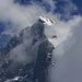 Auf der Kleinen Scheidegg (2061m) geben die mächtigen Quellwolken für kurze Zeit den Eigergipfel (3970m) frei. In weniger als 24 Stunden werde ich dort oben stehen!