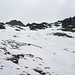 Blick über die steile Westflanke zum Gipfel vom Piz Murtera. Hier würde die Sommerroute (T5 / WS- mit wenigen Stellen Fels II) hochgehen. Wie verzichteten mangels Schnee (um die Ski zu schonen) auf diesen Aufstieg und traversierten lieber zum Sattel P.2916m wo der Nordgrat beginnt.