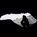 Menschen-Silhouette in einer Lavahöhle