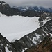 Ausblick vom Wilder Freiger nach Westen: ein Bergkamerad befindet sich gerade im Abstieg Richtung Müllerhütte