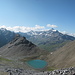 Blick unterhalb des Cotschen auf den Pass d'Ela (links) und den Piz Furnatsch (Bildmitte). Die Furschela da Tschitta ist das nächste Ziel.