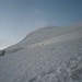 Die Gletscherrampe zum Doldensattel (P.3436m). Das Doldenhorn (3638m) versteckt sich noch in einer kleinen Wolke.