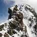 Blick von der tiefsten Einsattelung zum Turm den man überklettert, dahinter der Gipfel vom Bernina 4049m