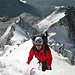 an der Gipfelwächte des Mont Blanc de Courmayeur.<br />Im Hintergrund beinahe der komplette Peutereygrat ab der Aiguille Blanche