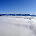 Panorama di cime sopra le nuvole