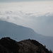 escursionista in pausa sulla cresta sud della cimetta d'Orino