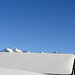 Die Gipfel des westlichen Teils der nördlichen Alpsteinkette verstecken sich hinter der Hütte der Alp Hinderfallen