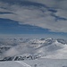 Blick vom Mattjischhorn: Ins Skigebiet von Hochwang. Und hinter der Wolke müsste Chur sein...