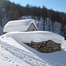 Le baite di Corte d'Ardui, sommerse dalla neve