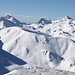 <b>Veduta sul versante orientale del Piz Val Gronda.<br />Sullo sfondo si nota anche il Biancograt del Piz Bernina.</b>