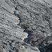 Wasser frißt sich in den Gletscher