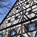 Gasthof “Goldener Hirsch”. Zitat: "... erbaut im Jahre 1630, zählt zu den schönsten Fachwerkbauten der Oberpfalz."