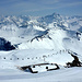 Gipfelblick Ost - Richtung Allgäuer Alpen. Man beachte das völlig überlaufene Skigebiet (im Bild die Hauptpiste).