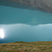 die Sonne spiegelt sich im Lac de Moiry