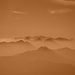 Fernsicht über dem Dunst: Die Berninagruppe am Horizont