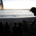 Abendstimmung am Strand bei einem Glas Rotwein als Aperitiv
