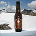 Una birra confederata, rossa come la montagna alle sue spalle e bianca come la neve ai suoi piedi
