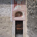 San Carlo di Negrentino. Nella lunetta un "Ecce Homo", nella parte superiore San Michele, entrambi gli affreschi sono databili al 1500. 
