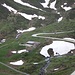 <b>Alpe di Cruina (2002 m), lungo la strada del Passo della Novena.<br />Da quel tornante inizia il sentiero per la Capanna Corno Gries.</b>