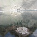 Il Pizzo Trona si specchia nelle gelide e limpidissime acque del Lago Rotondo