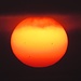 "Dampfende" Sonne mit Sonnenflecken am 30. Juni um 5.30 Uhr aufgenommen mit dem 35-fach Zoom.<br />Bei dem Fleck links unten sieht man sogar die "Verwischung", vgl. auch mit den Bildern von [http://sdo.gsfc.nasa.gov/data/]
