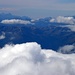 Blick Richtung Sudwesten, ubers die Wolken, im Hintergrund, die Dolomiten.