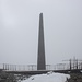 <b>A mezzogiorno raggiungo una piattaforma panoramica con al centro una sorta di obelisco di ferro: Schwarze Schneide (3340 m) geschafft! <br />È uno dei “Big 3”: tre cime che superano i tremila metri, raggiungibili dagli sciatori. </b><br />