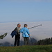 I'm sure these hikers think it too "It's  nice to be above the fog!"