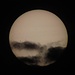 Die Sonne am 27.07.2012 um 20.20 Uhr mit Sonnenfilter aufgenommen. Man sieht hier die Sonnenflecken und heranziehende Wolken. Ich finde, die Wolken sehen aus wie die Figur der Krater auf dem Mond! Vielleicht ist der "Hase" schnell hergewechselt?
