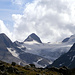 Dal passo della Novena, il grande ghiacciaio del Gries, con il la Punta dei Camosci a sinistra, il Corno Rosso al centro, a destra tra le nubi il Corno Cieco / BlinnenHorn