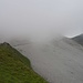 In den Wolken die Schlicker Seespitze, darunter im Geröllfeld der weitere Weg zum Seejöchl