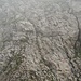 Der Aufstieg zum Hundstein vom Höll Sattel. Leichtes Klettern dem roten Punkt hoch
