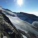 Die kleine, felsige Punta Giordani; zuerst müssen wir noch auf den Gletscher absteigen