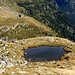 Scendendo puntiamo al laghetto dei Corti, per poi proseguire all' Alpe Quarnei