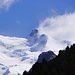 Auch die Wolken um Gipfel der Monte Rosa lichten sich: Nordend und Dufourspitze. 