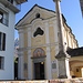La chiesa di San Gottardo a Mergoscia, sopra la caratteristica finestra trilobata della facciata vi sono delle insegne vescovili in stucco della fine del secolo XVIII. La colonna cimiteriale, di particolare bellezza, fu posta nel cortile nel 1715. 