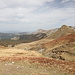 Unterwegs zum Bregoč / Брегоч - Ausblick am Borovno Brdo / Боровно брдо (etwas abseits des eigentlichen Weges) in Richtung Stog / Стог. Über das sichtbare Stück der Piste werden wir später vom Orlovačko jezero / Орловачко језеро zurückkehren.