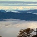 Dal Monte Crocetta, vista sui vari strati di nebbia e sulle alpi lontane