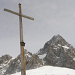 Gipfelkreuz Eiskarlschneid, im Hintergrund der Torstein